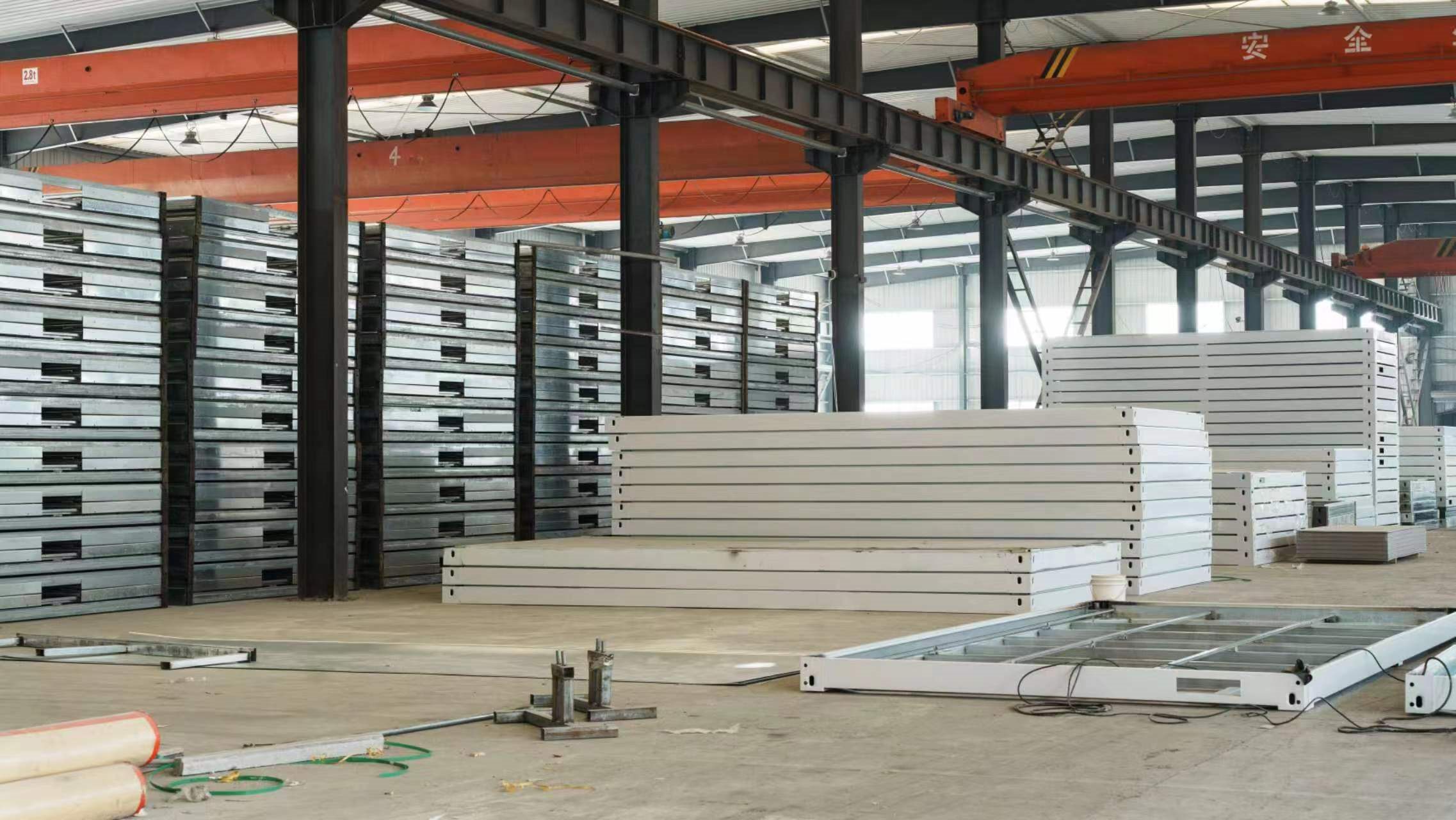 Insulated wall and roof panels prepared in the workshop
