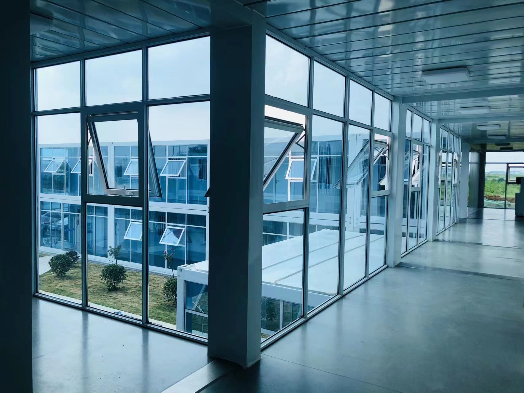 Completed project-office corridor with glazed partitions